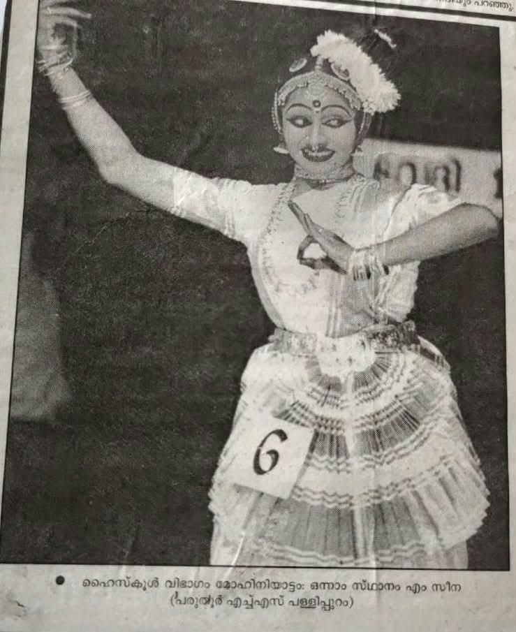 Sarvasri Sukesh in classical dance costume with number six badge